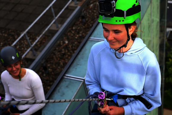 What does it feel like to be lowered backwards off the roof of Vertigo? That can be read on the faces of three first-year Applied Mathematics students who took on the challenge together.